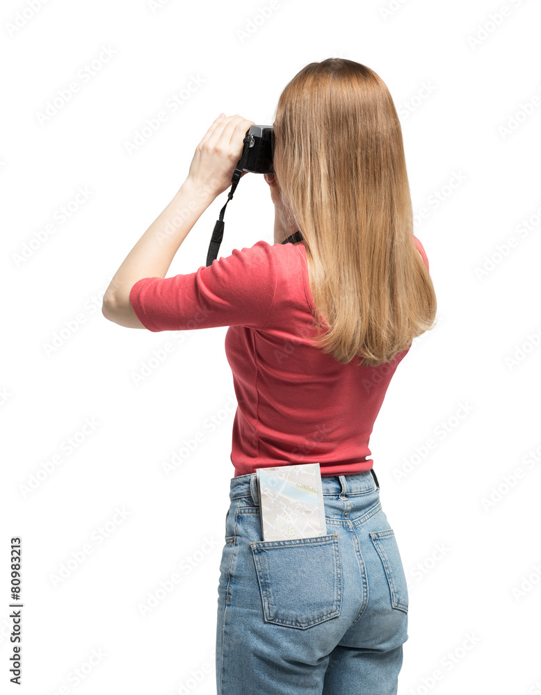 Tourist young woman is taking a picture. Isolated. Tourist young woman is taking a picture. Isolated.