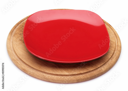 red dessert plate on a wooden board.