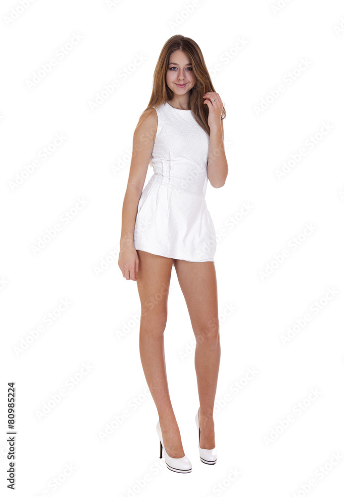 Fashion  beautiful girl with modern white dress posing in studio