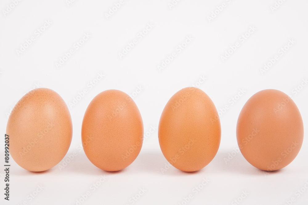 Chicken eggs on white paper background Chicken eggs on white paper background