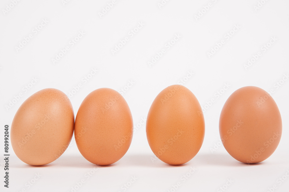 Chicken eggs on white paper background Chicken eggs on white paper background