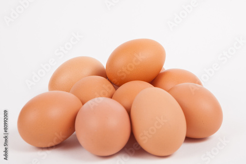 Chicken eggs  on white paper background