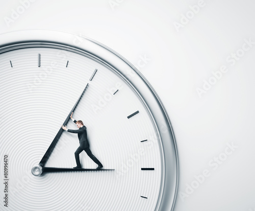 Businessman trying to stop time