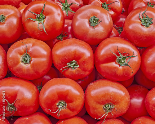 organic red tomatoes closeup at the local market