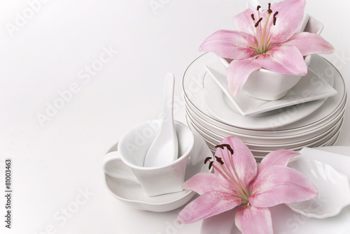 Dishware and lilies