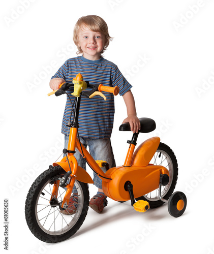 Portrait of a cute boy on bicycle