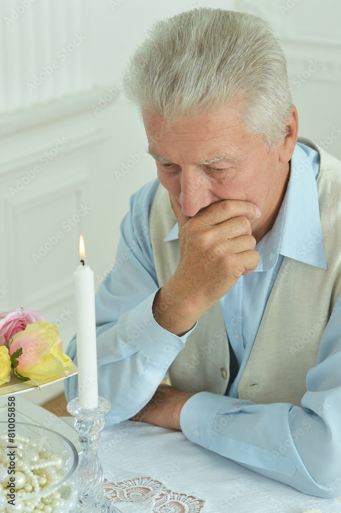Fototapeta premium Pensive elderly man