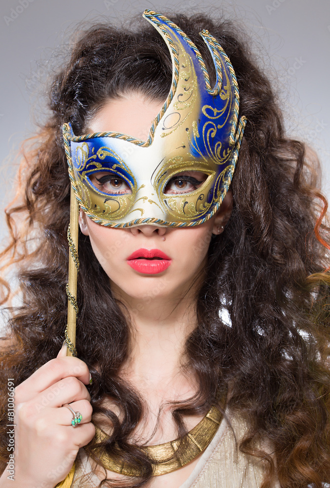 Girl with Venetian mask