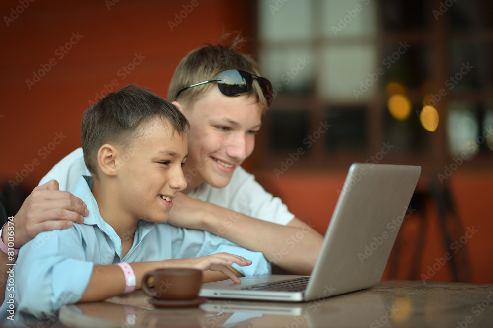 brothers with laptop brothers with laptop