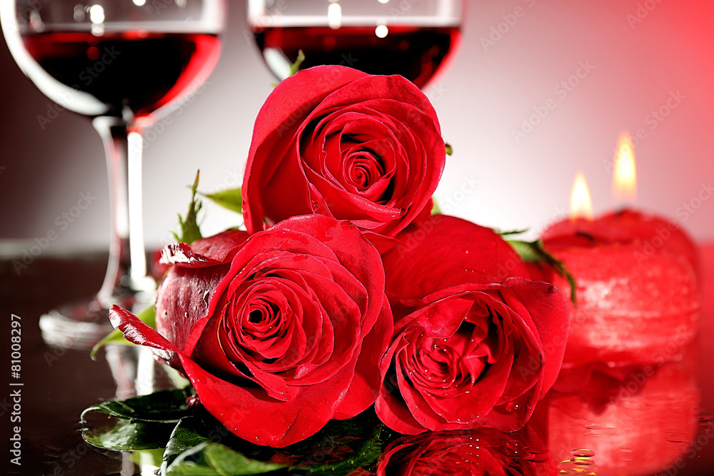 Composition with red wine in glasses, red rose and decorative Composition with red wine in glasses, red rose and decorative