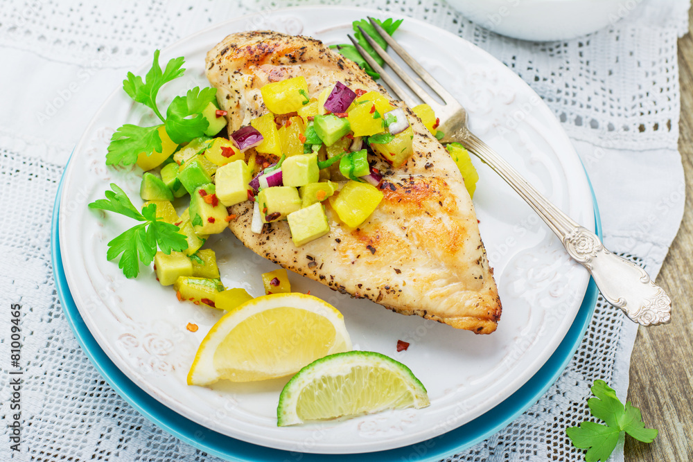 Grilled chicken breast with salsa pineapple, avocado and sweet Grilled chicken breast with salsa pineapple, avocado and sweet