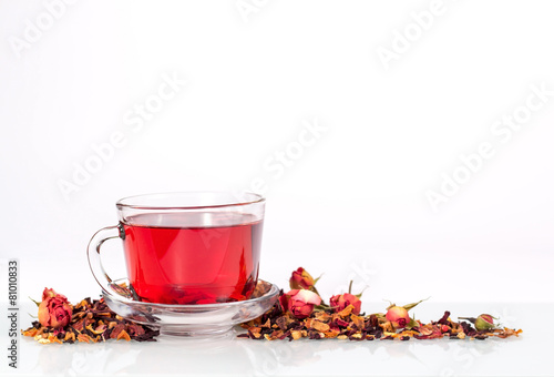 isolated transparent mug of red tea with dried rose