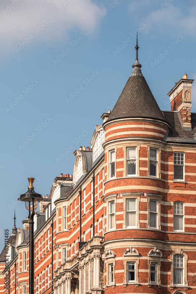 Obraz premium Vintage Red Brick Castle-like Building in London, UK
