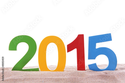 2015 sign on beach sand