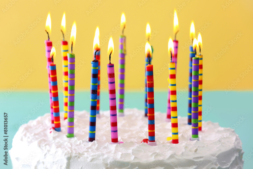 Birthday cake with candles on color background Birthday cake with candles on color background