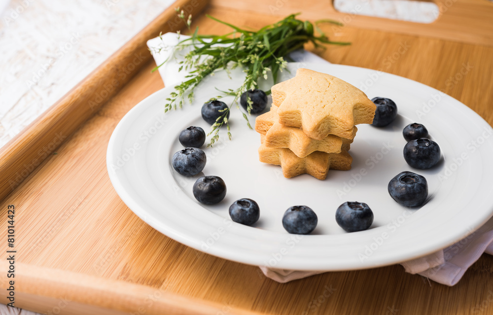 Plate with blueberry and cookies Plate with blueberry and cookies