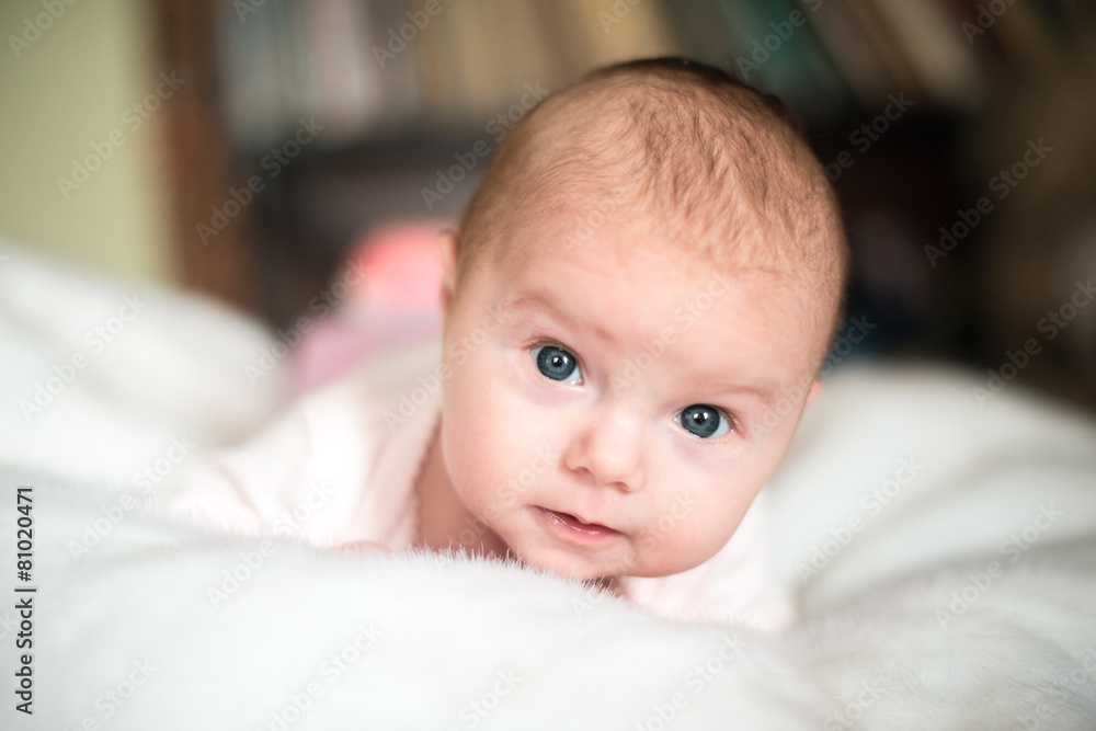 smiling baby looking at camera under a white blanket/towel smiling baby looking at camera under a white blanket/towel