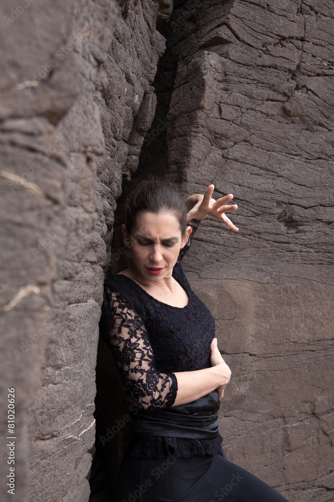 Flameco dancer in a basalt ravine Flameco dancer in a basalt ravine