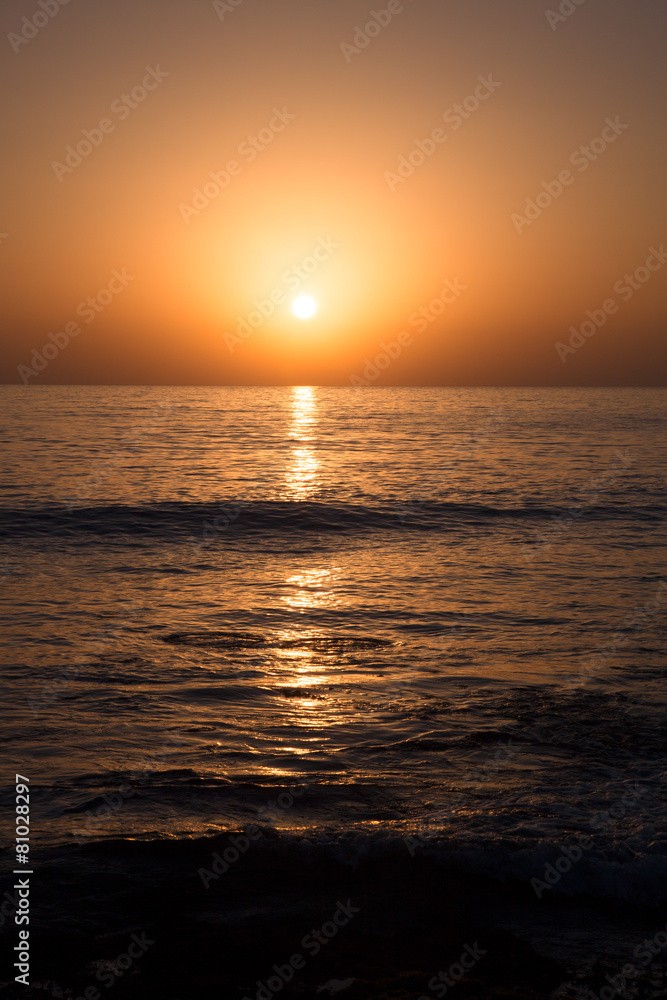 Shine of the sun setting over the horizon Shine of the sun setting over the horizon