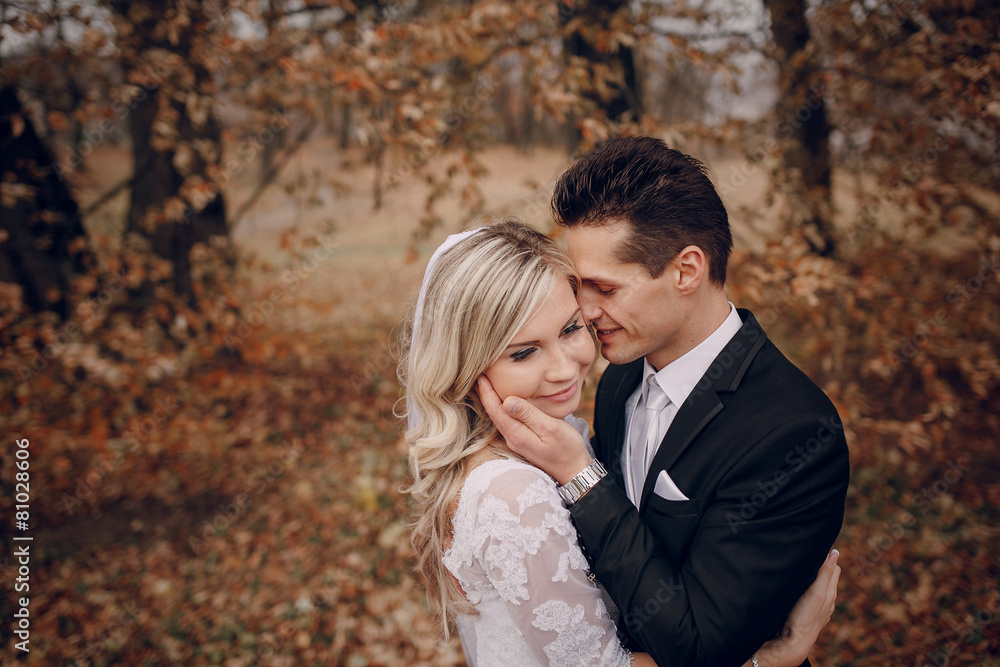 bride walking in golden autumn nature