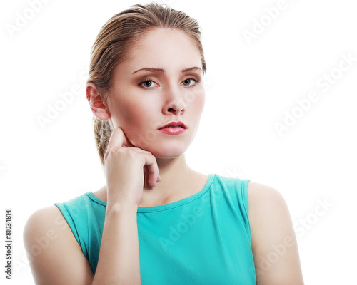woman with hand on chin