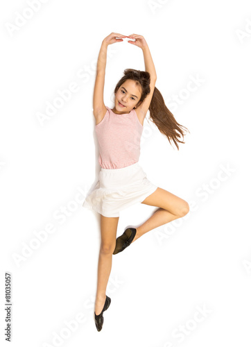 Isolated photo of cute smiling girl dancing ballet