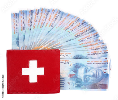 Swiss francs in red wallet with flag application photo