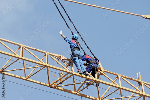 Workers on the crane photo