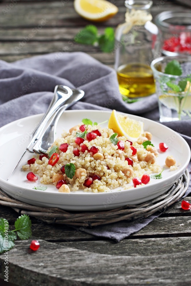 Quinoa salad with chickpea and pomegranate.Healthy eating. Quinoa salad with chickpea and pomegranate.Healthy eating.