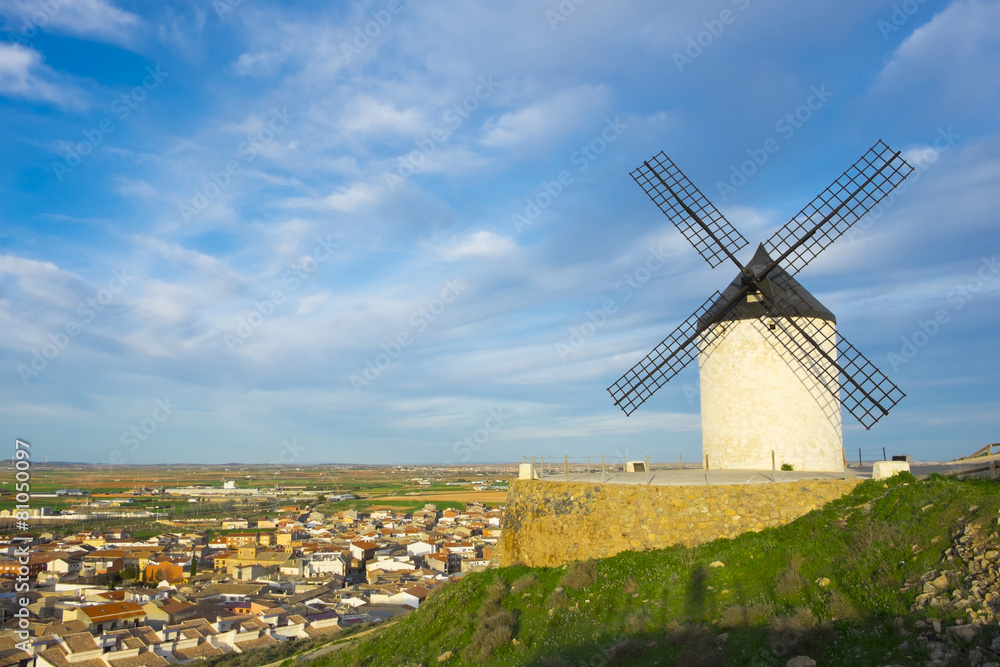 Blue sky and windmills in the background,  Castilla-La Mancha.