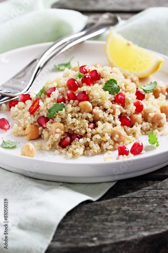 Quinoa salad with chickpea and pomegranate.Healthy eating.