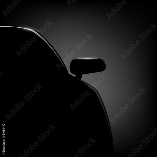 Car silhouette on a black background.