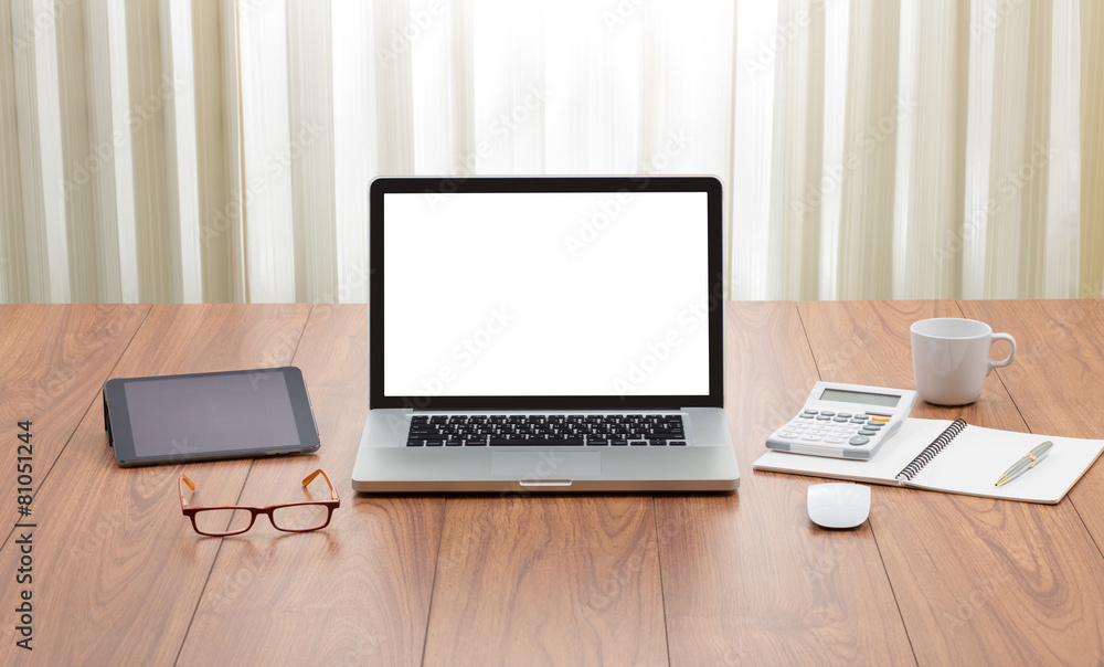 Blank screen laptop computer with office accessories on wooden t Blank screen laptop computer with office accessories on wooden t