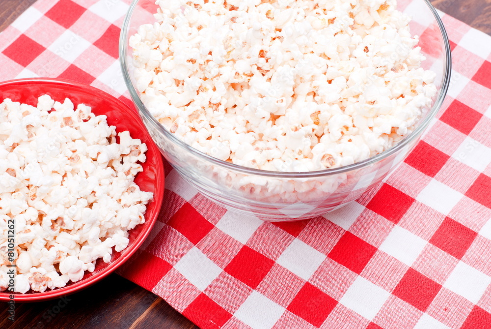 popcorn in a bowl on the table top view popcorn in a bowl on the table top view