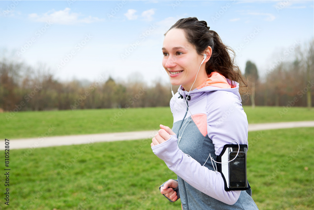 Young attractive woman running at the park Young attractive woman running at the park