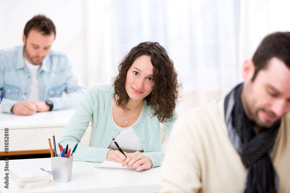Young attractive student taking exams Young attractive student taking exams