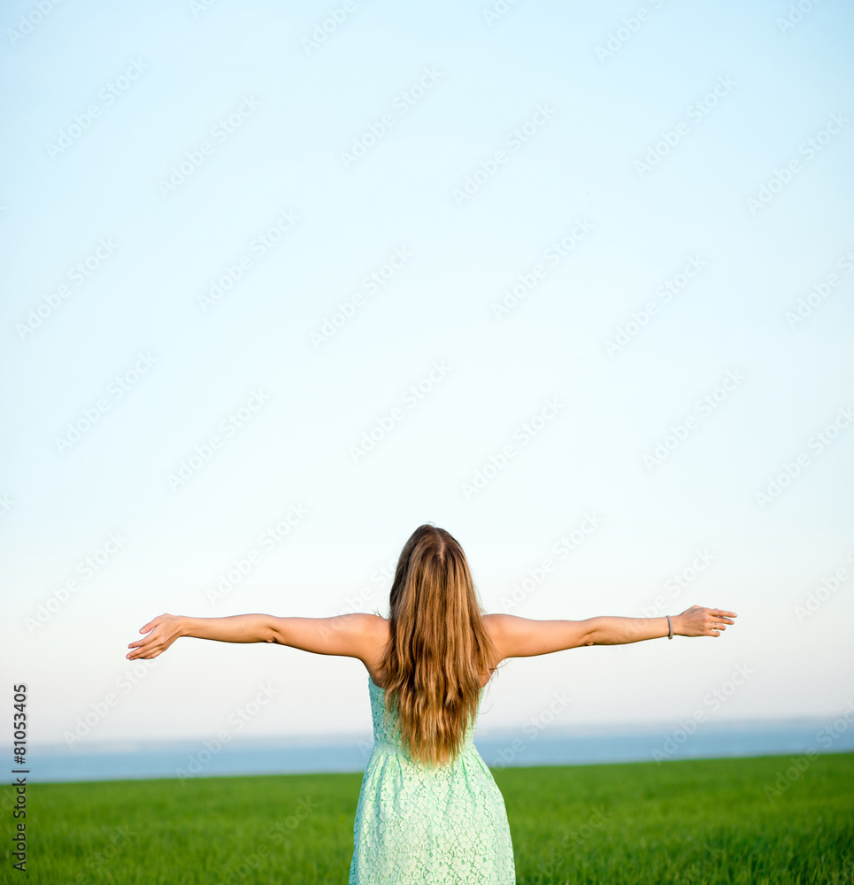 Happiness woman stay outdoor under sunlight of sunset Happiness woman stay outdoor under sunlight of sunset