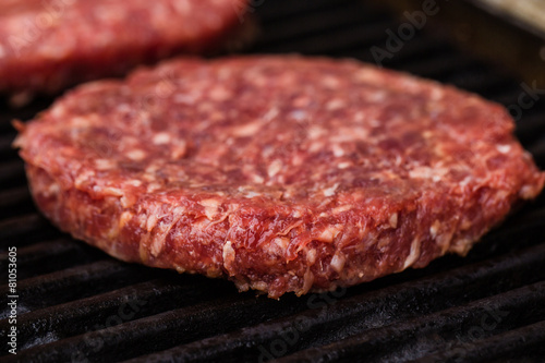 Preparing a batch of  grilled ground beef patties or frikadeller