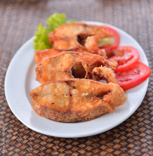 fried fish on white plate