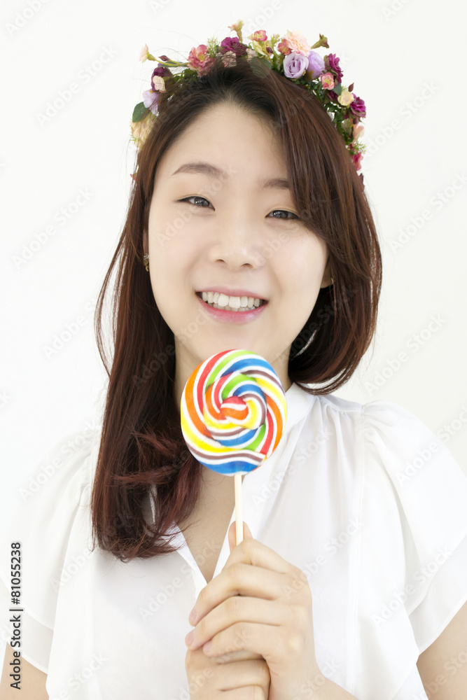 Asian woman with lollipop