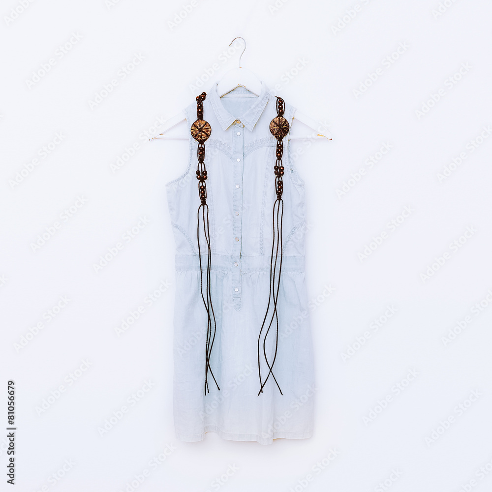 Wooden jewelry and denim clothing. fashion combination Wooden jewelry and denim clothing. fashion combination