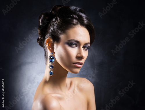 Young, beautiful and rich woman in jewels