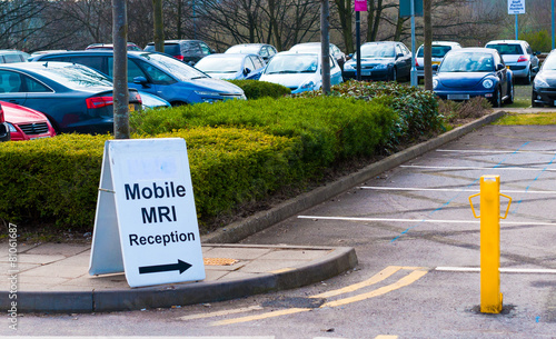 Mobile MRI scanning sign in a car park
