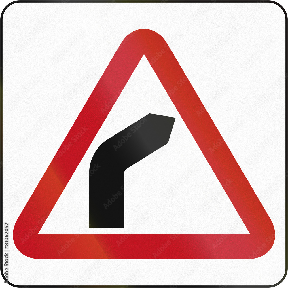 Bruneian sign warning about a right curve