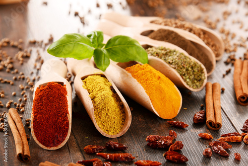 Fototapeta Naklejka Na Ścianę i Meble -  Variety of spices on kitchen table