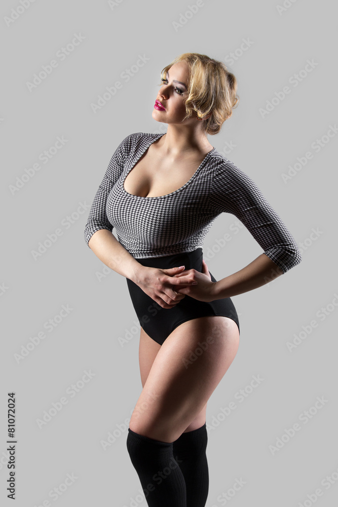Naklejka premium Modern dancer in vintage swimsuit