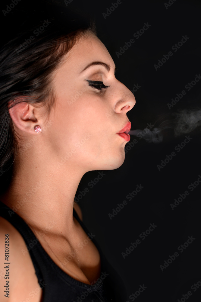 Fototapeta premium Smoking woman with a cigarette