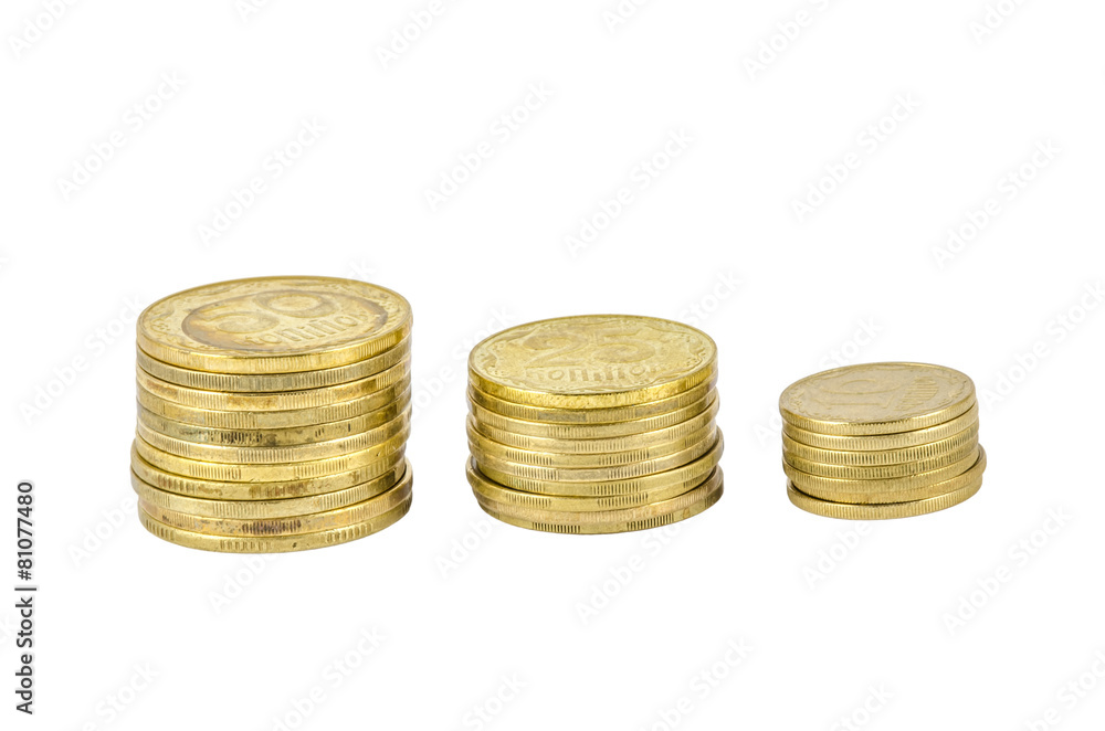 Three stacks of Ukrainian coins isolated on white Three stacks of Ukrainian coins isolated on white