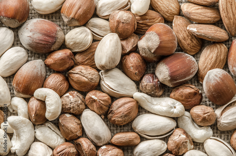 Group of different nuts isolated on bagging Group of different nuts isolated on bagging