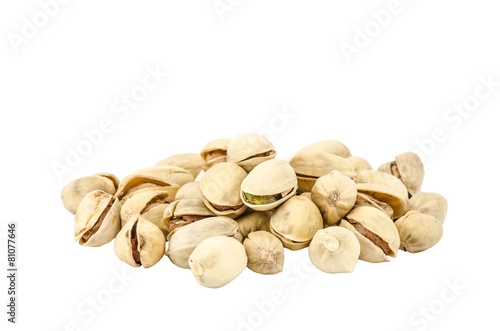 Group of pistachios closeup isolated on white